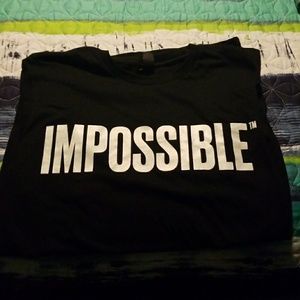 Impossible black t shirt. Brand new.